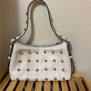 Coachtopia Alter ego with rivets